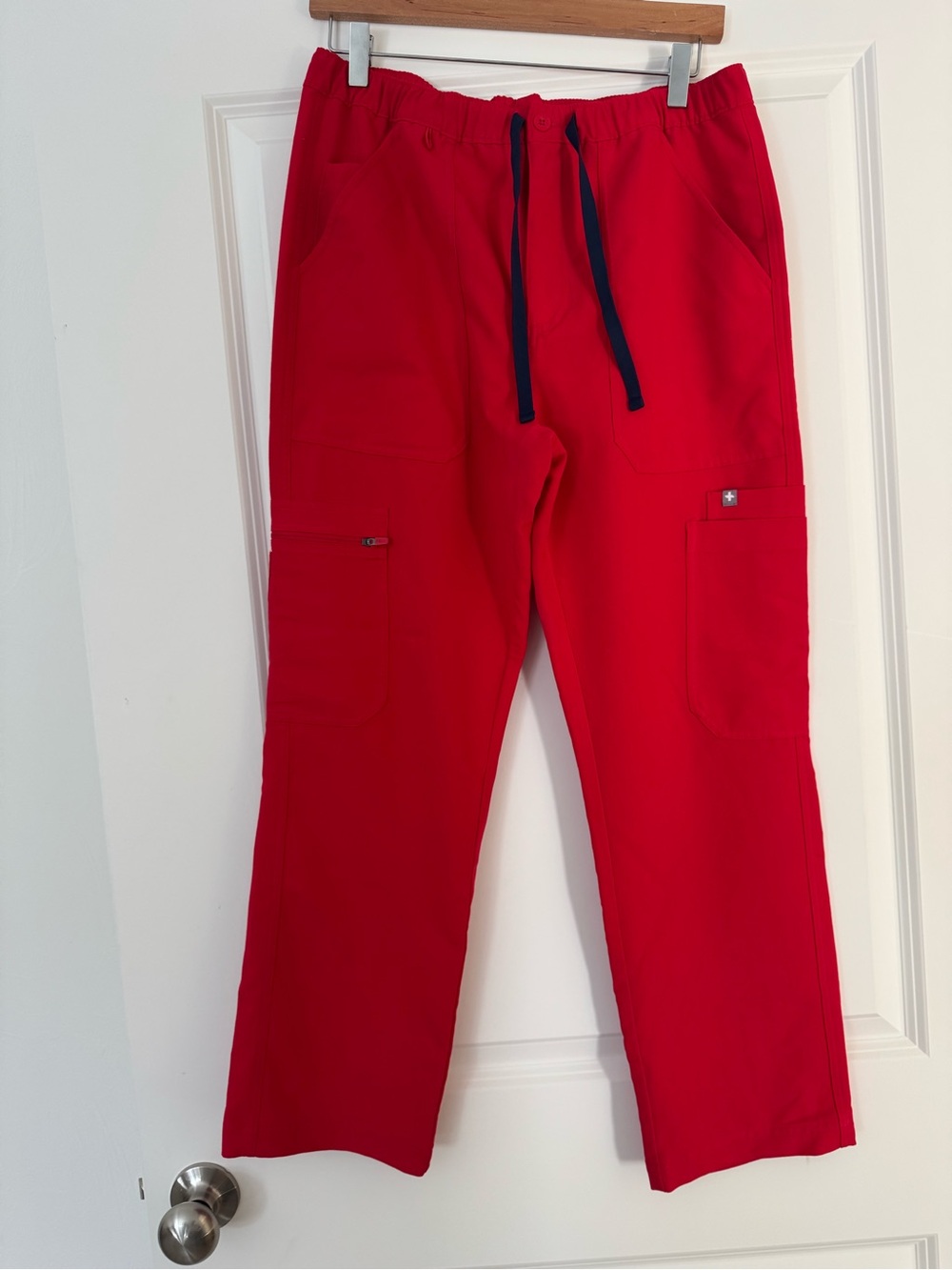 Figs woman’s Pop Red Cargo Pants with Navy Drawstring.  Mint condition.
